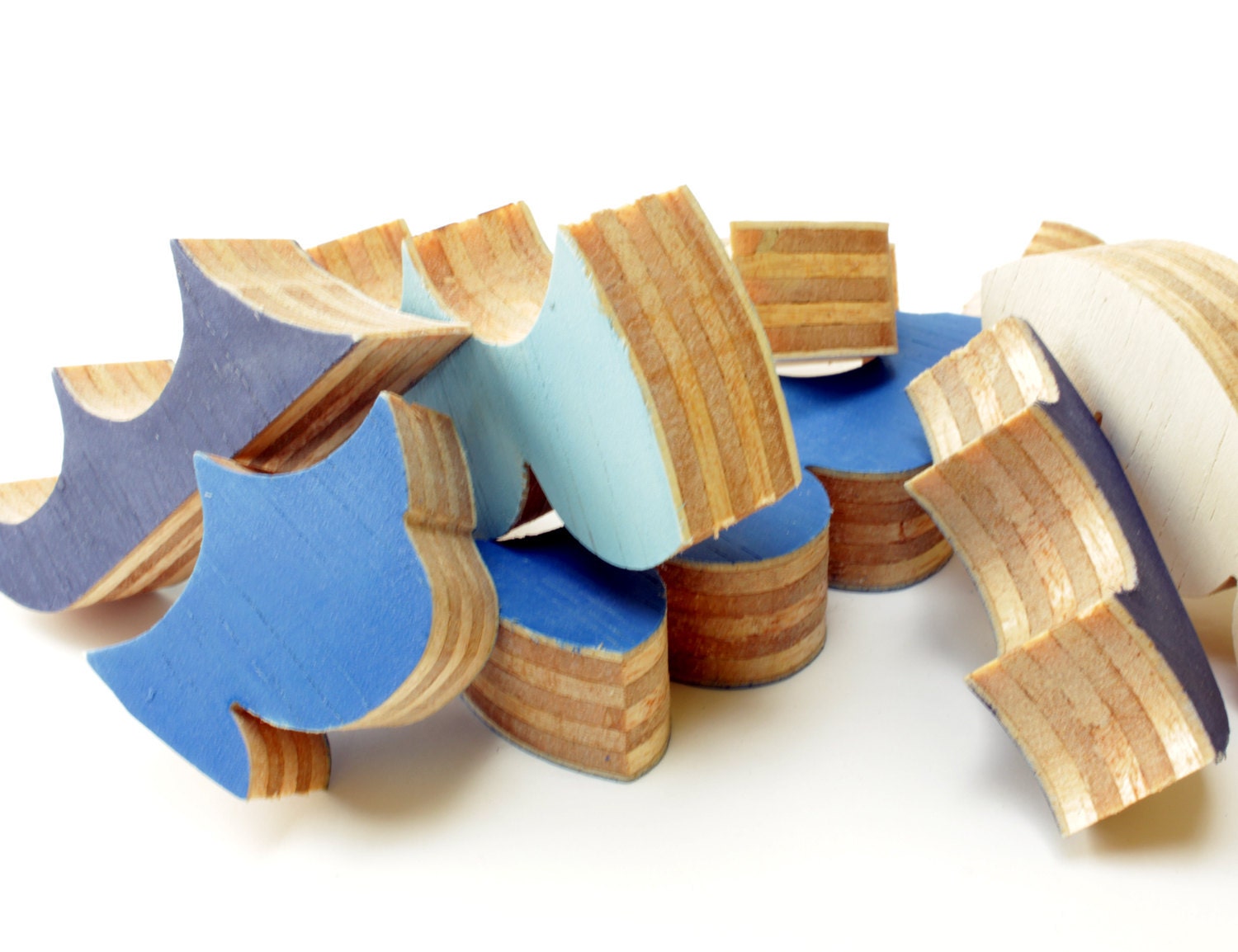 Puzzle whale. Children's game, wood toy, wooden puzzle, whale puzzle with waves.