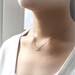 Happy whale necklace in matte silver