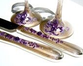 Elegant wedding cake serving set, hand decorated with purple fleur de lis pattern on a gold background