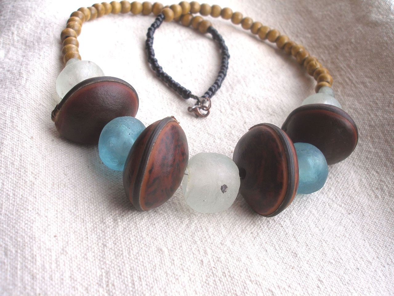 African Blue and  white clear recycled glass Mucuna seed  wood necklace by Fianaturals