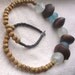 African Blue and  white clear recycled glass Mucuna seed  wood necklace by Fianaturals