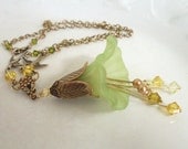Lucite flower necklace, green, yellow. Flower pendant with stamens, birds, crystal and brass. Lucite flower jewelry, brass jewelry. - ArtfulTrinkets1
