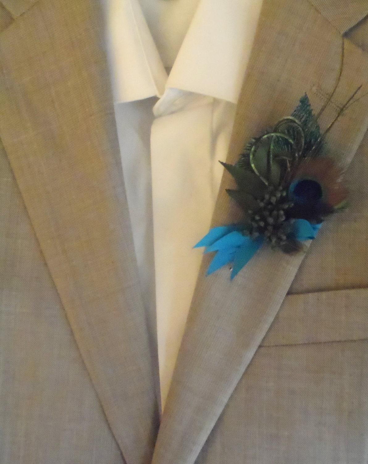 Peacock boutonniere, lovely and elegant classic favorite