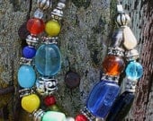 Mardi Gras - Multi color glass bead bracelet with silver accents.  Double strand.