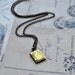 Necklace. Secret Story Book. Tiny brass locket on brass chain. By Vintette on Etsy.