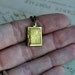 Necklace. Secret Story Book. Tiny brass locket on brass chain. By Vintette on Etsy.