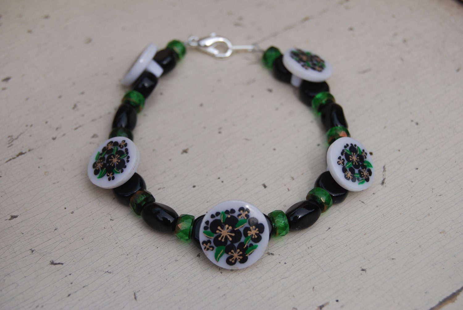 Black Floral Button Bracelet with Black and Green Glass Beads, 8 to 12 Years Size (Item 408)