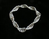 14 Ga. single helix squarewire silver bracelet