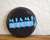 1980s Black Miami Vice Pin Turquoise Lettering