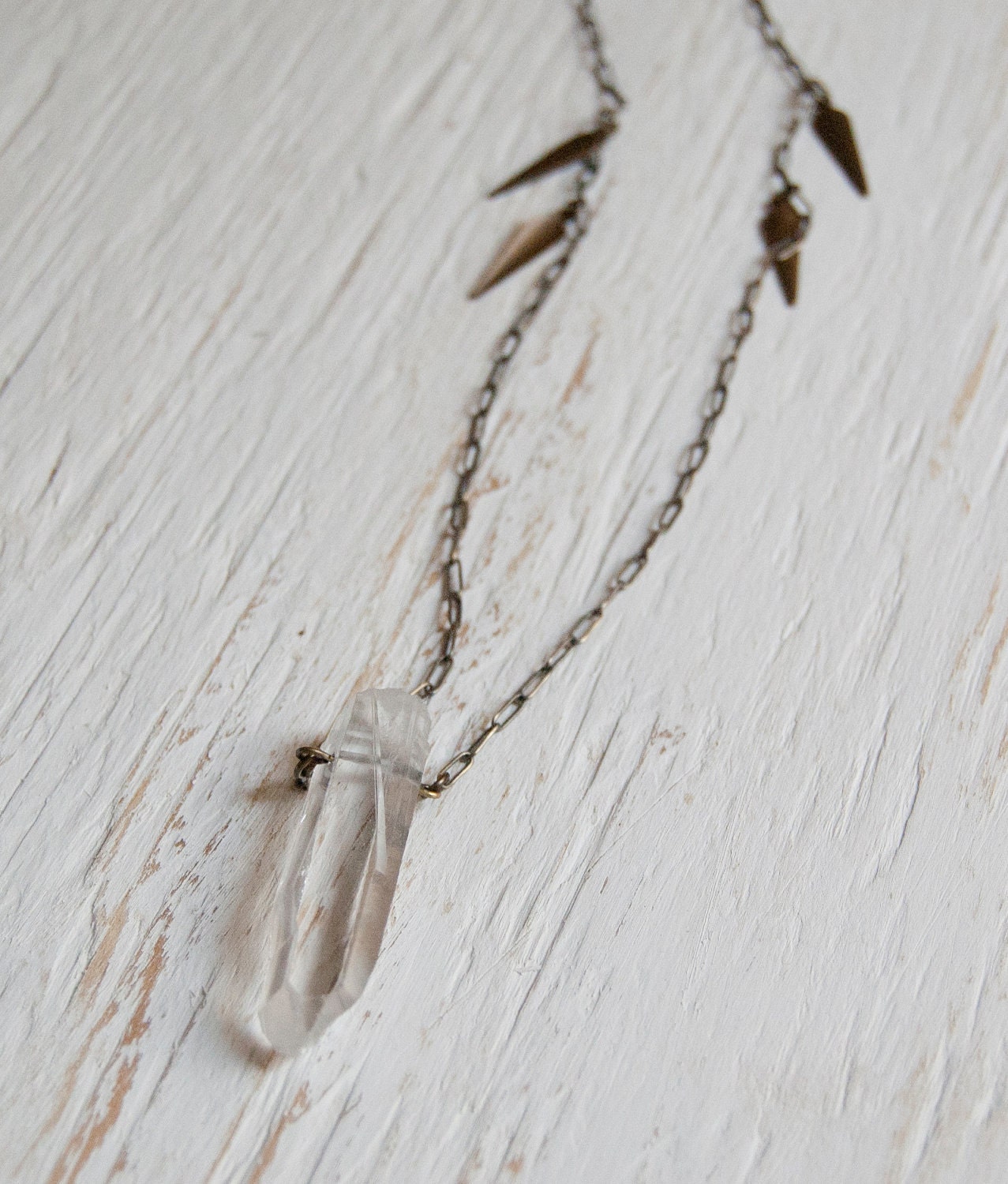 The Quartz and Dagger Necklace - Natural quartz crystal with dagger charms