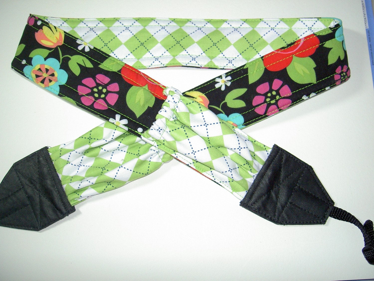 Fresh Limes in a Funky Garden Camera strap, reversible, 2 expandable pockets with stretchable elastic.