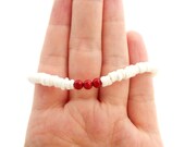 tara bracelet - fire engine red coral, white shell beads, and sterling silver