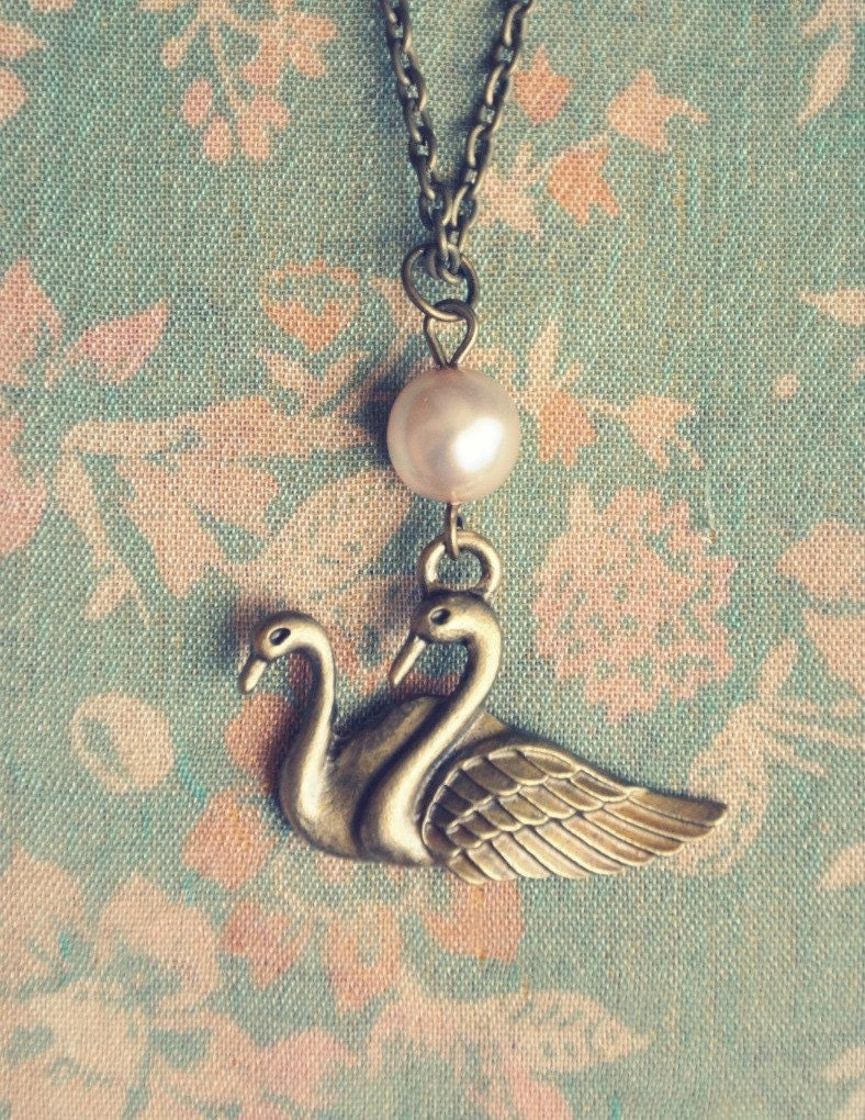 swan and pearl necklace.