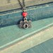 I heart my camera necklace.