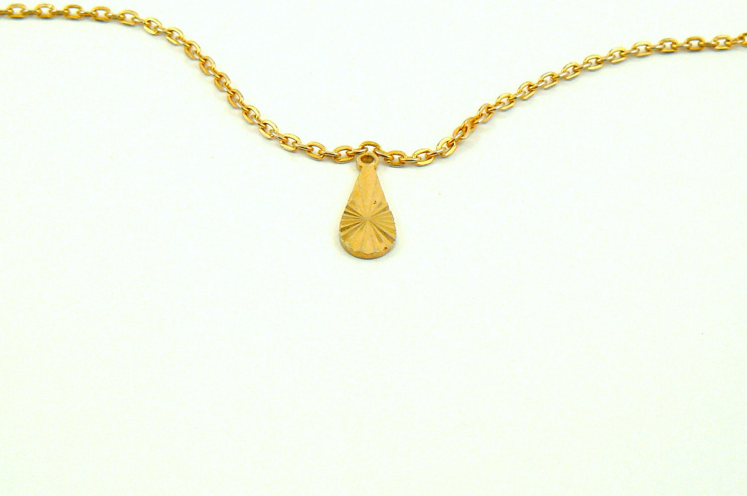 Vintage gold teardrop pendant
