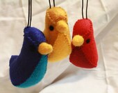 set of red, blue and yellow "banana bird" felt ornaments