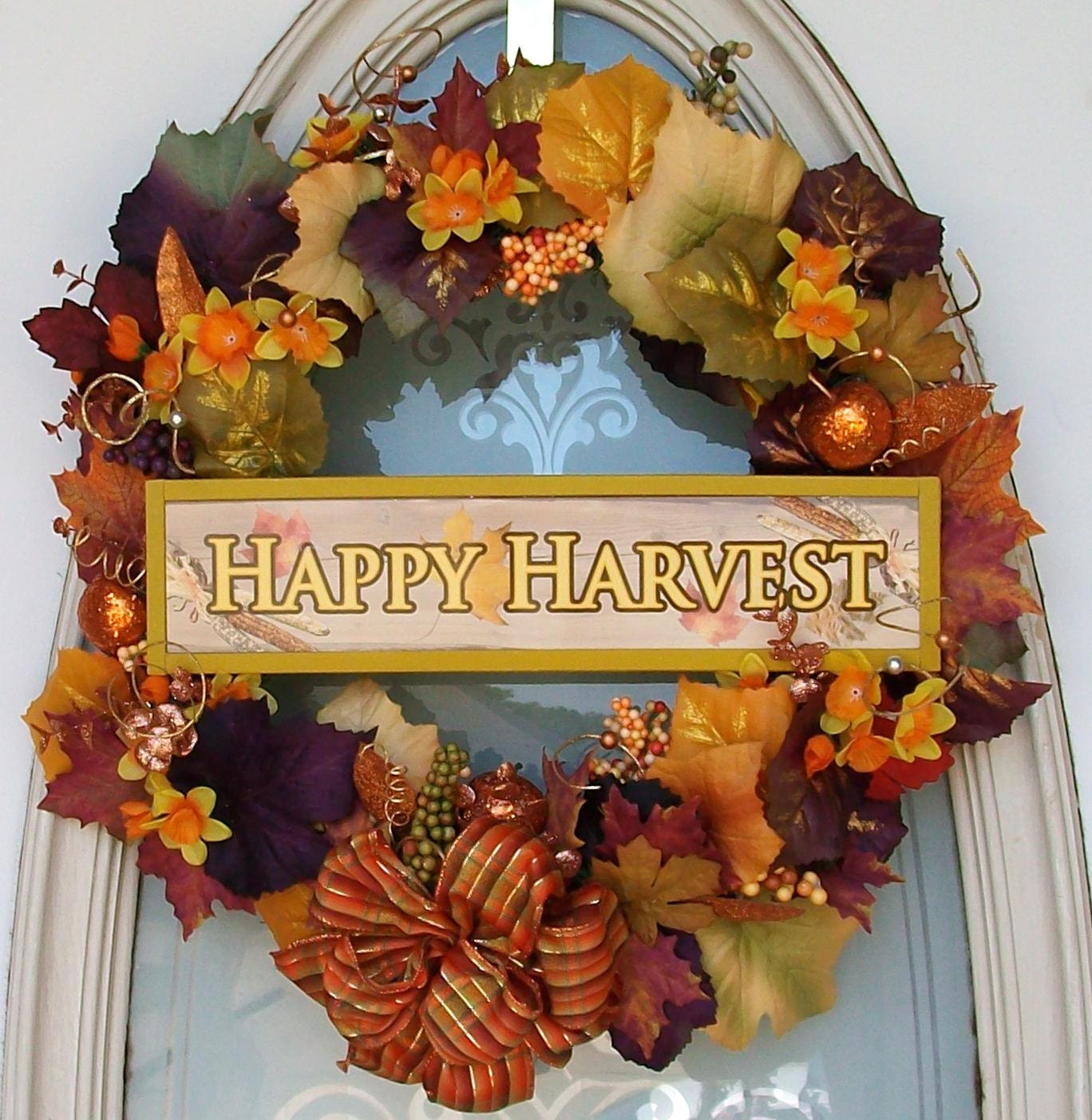 Happy Harvest Wreath of Autumn colors of orange, fall rustic, maple brown, golden, burgandy, purple. Faux berries, gladiolas