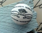 Handstamped Optician knob