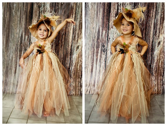 Scarecrow tutu dress. Crocheted top and with raffia and matching hat . Flower and crow embellishments