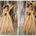 Scarecrow tutu dress. Crocheted top and with raffia and matching hat . Flower and crow embellishments