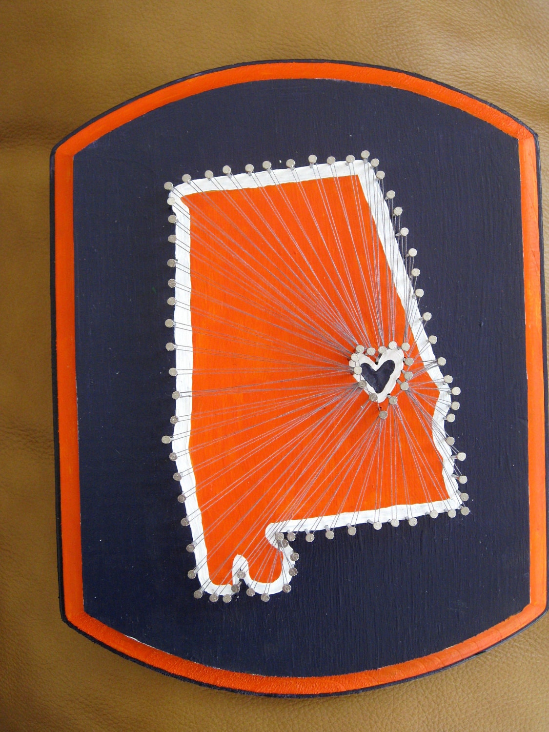 State pride- Nail and string on a painted wooden plaque- Auburn University