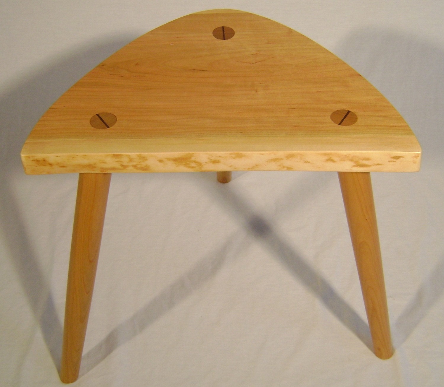 Naturalist stool made from locally harvested wild black cherry.