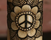 Henna Candle with a flower peace sign
