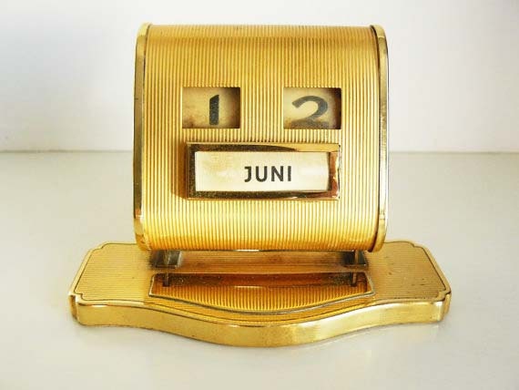 vintage brass perpetual calendar