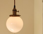 Light Fixture with 6" White Glass Globe Shade and Exposed Socket