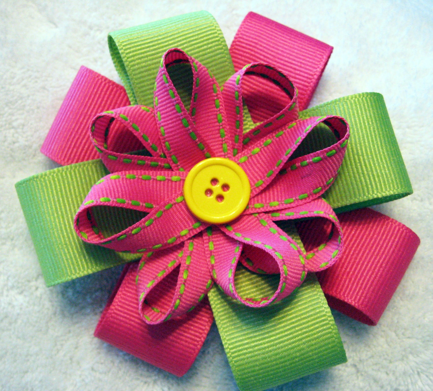 Pink and Green Ribbon Flower with Yellow Button Center