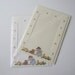 2 die cut card blanks for framing photographs, embroidery or cross stitch inserts ... cream and white with pretty Hedgehog designs