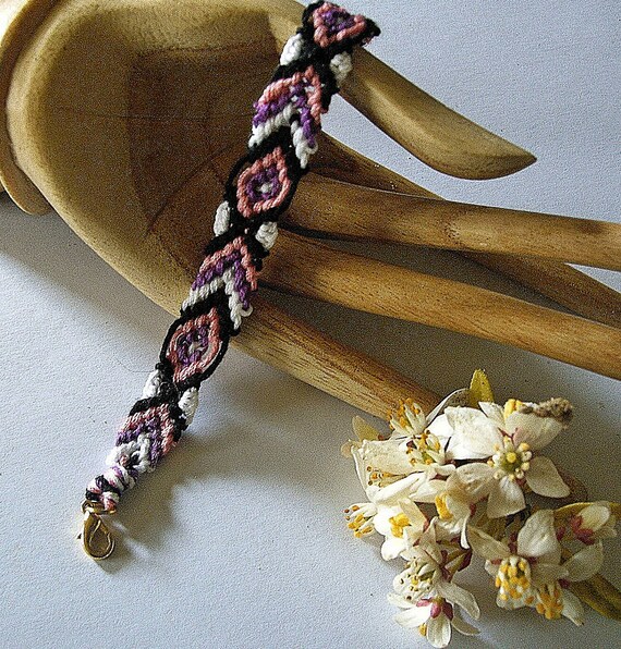 Tribal bracelet. Pink and black friendship bracelet.
