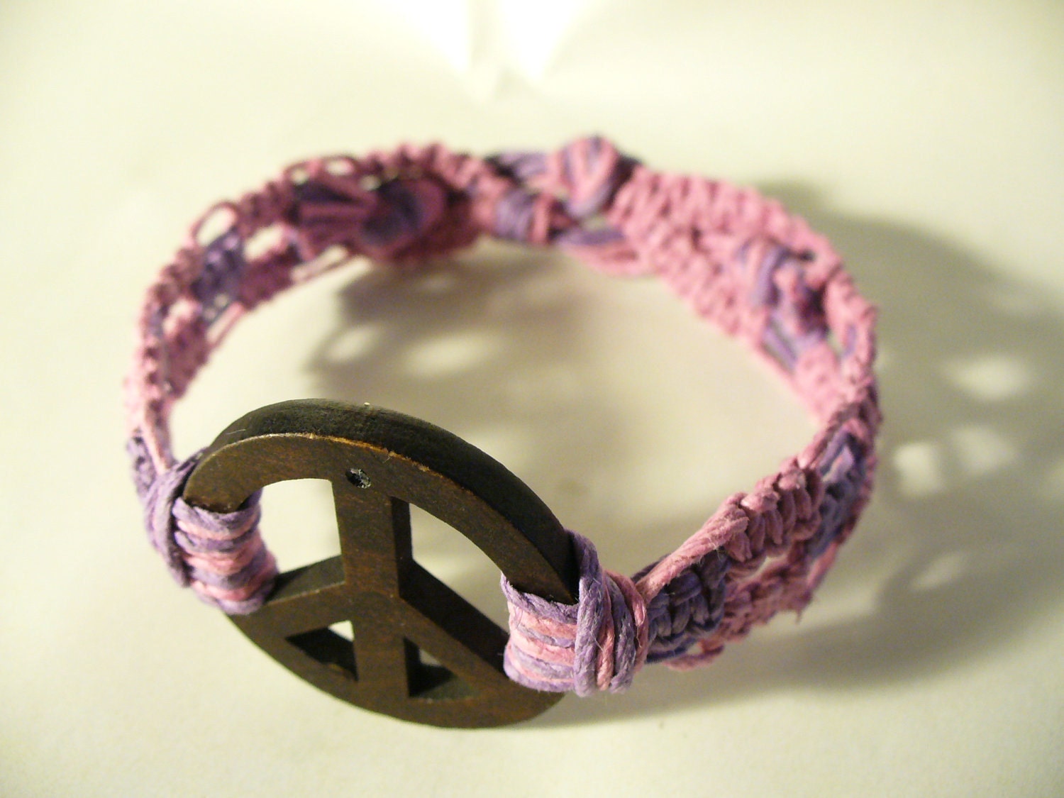 Hemp Jewelry Bracelet baby pink and lavender with Wooden Peace Sign center bead