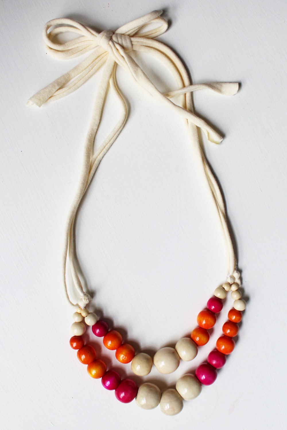 Color Pop Necklace in Bubblegum, Orange & Cream . Non-toxic Beads with a Jersey Tie . Fashionable and baby-friendly