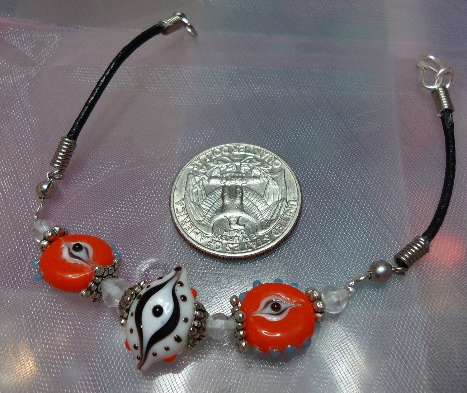 White & red/orange Evil Eye bracelet