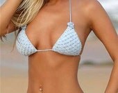 Crochet bikini in light blue color with small flowers