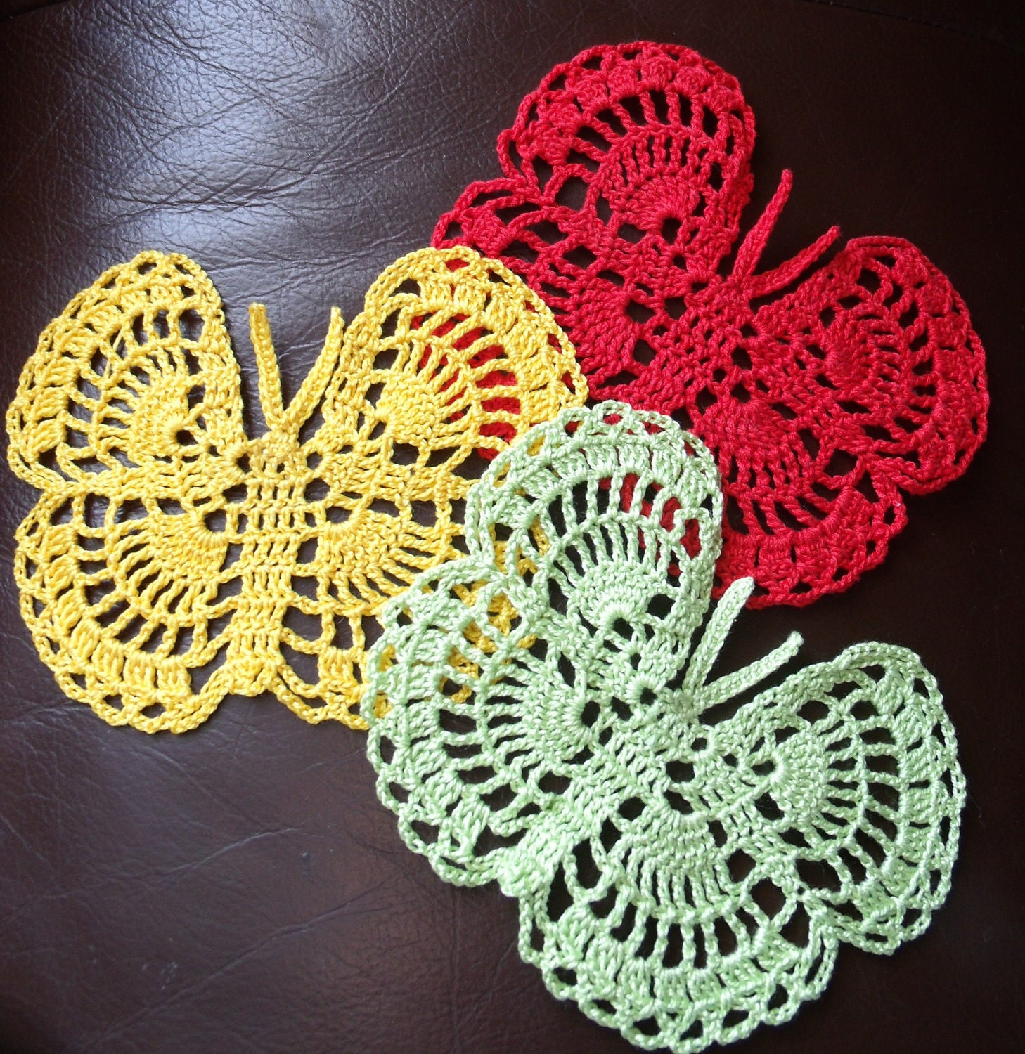 Crochet butterfly appliques small doilys in spring colors