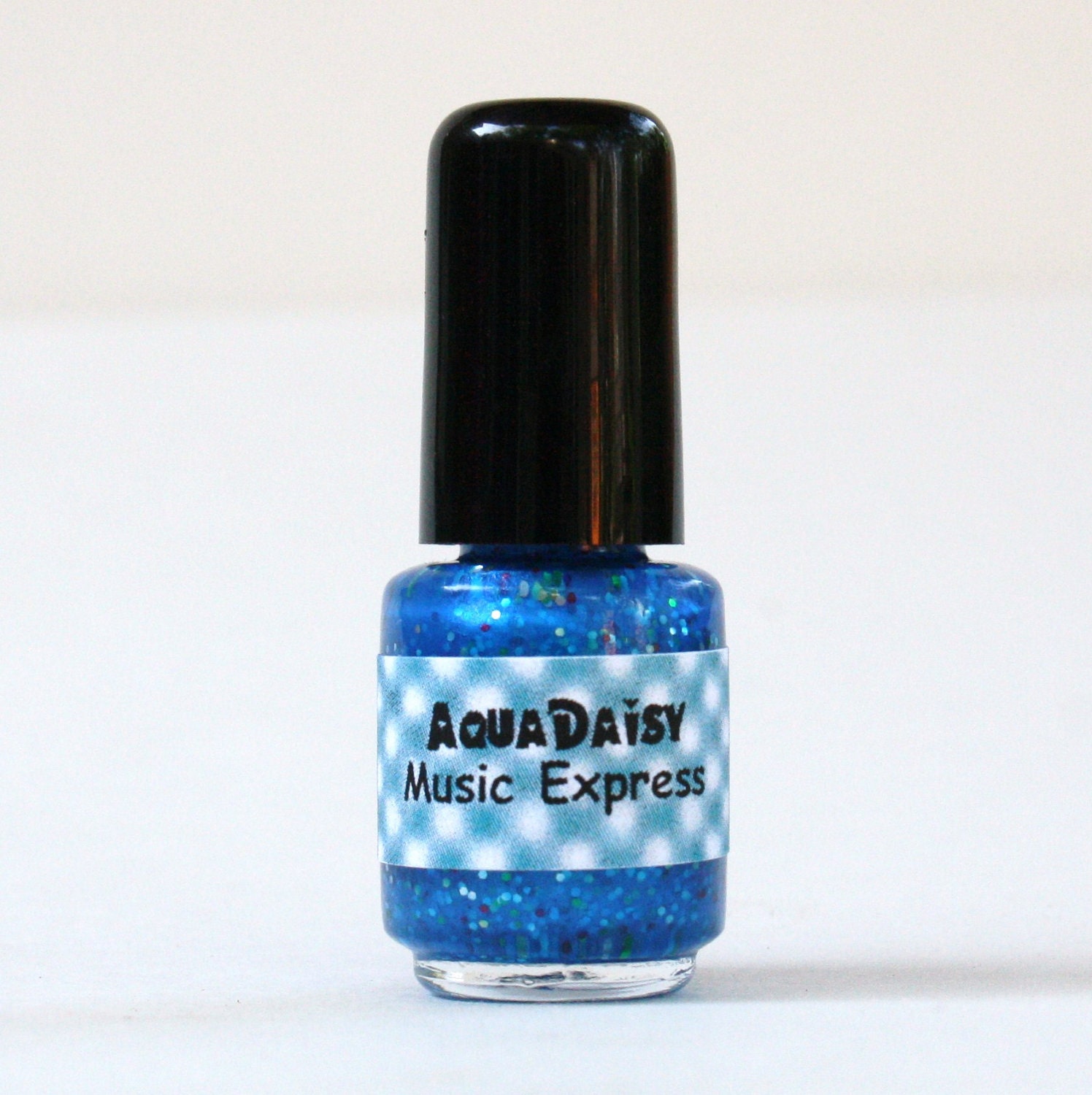 Mini Blue glitter nail polish Music Express