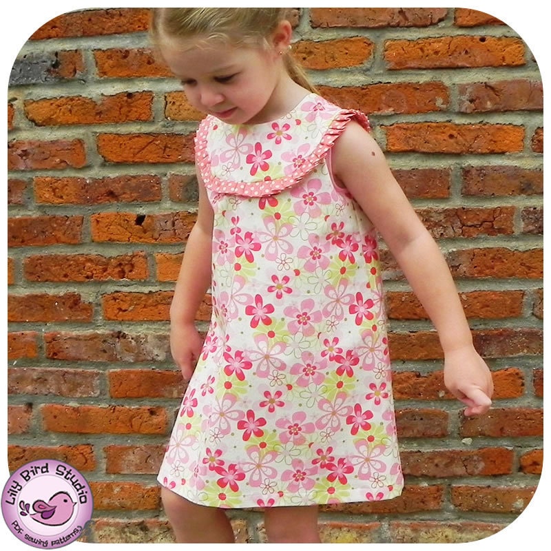 Bia's A line dress PDF sewign pattern for beginner to intermediate sewers, rounded yoke w/pleats, closes w/packet and buttons, 1 to 8 yrs