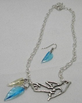 Hunger Games inspired mockingjay with blue and gold glass