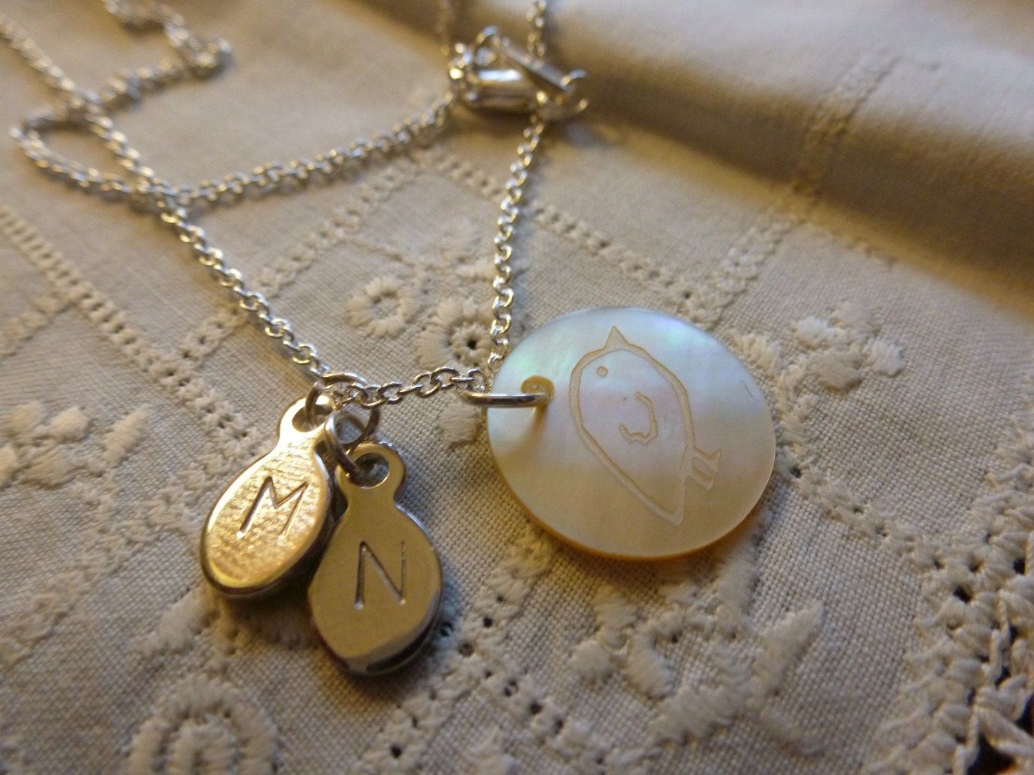 Sterling Silver Necklace with a Mother of Pearl "Chick" Pendant and 2 Initial Charms