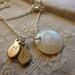 Sterling Silver Necklace with a Mother of Pearl "Chick" Pendant and 2 Initial Charms