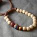 OOAK Hand Made Tasseled Wood Beaded Bracelet with Accents of Ceramic, Semi-precious, Glass