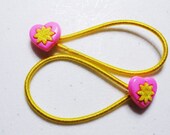 Yellow Ponytail Holder Featuring a Sweet Pink Heart with Yellow Glitter Flower Center