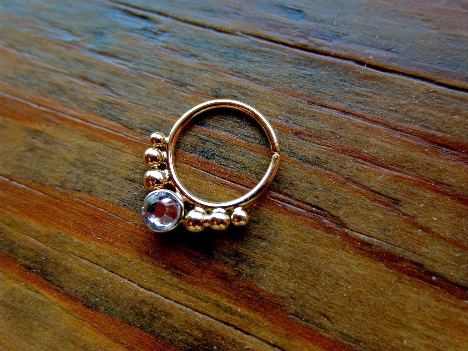 18k yellow gold "Balls and Stone" nose hoop (Swarofski) 20g