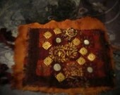 Cinnabar wrist cuff