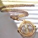 Harry Potter a Time Turner in Hand Necklace , Silver & Gold with Personalized Parchment Note (silver sparkly)