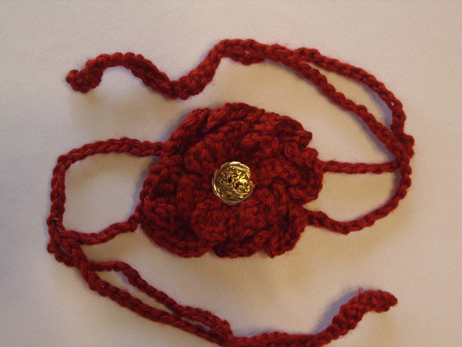 Dark red crocheted flower headband
