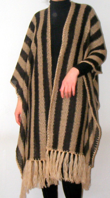 brown poncho,shawl,warm,soft,new trend,fashion accessories fall,spring,march trends,for her,tricot fabric,tassel,gift idea,line strip