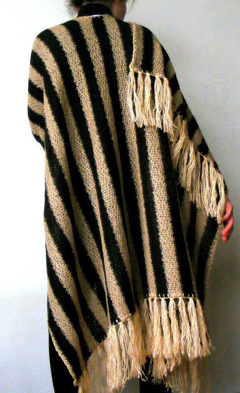 brown poncho,shawl,warm,soft,new trend,fashion accessories fall,spring,march trends,for her,tricot fabric,tassel,gift idea,line strip